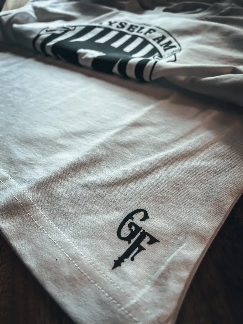 Strange & Unusual Tee